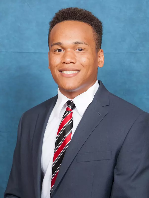 Head shot of TJ Elliott