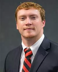 Head shot of Thomas Sykes