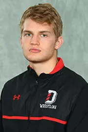 Davidson’s wrestling team pose for head and social media photos at the Belk Arena on Tuesday, October 6, 2020 in Davidson, North Carolina.
