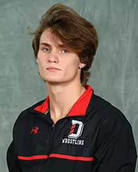 Davidson’s wrestling team pose for head and social media photos at the Belk Arena on Tuesday, October 6, 2020 in Davidson, North Carolina.
