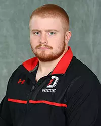 Davidson’s wrestling team pose for head and social media photos at the Belk Arena on Tuesday, October 6, 2020 in Davidson, North Carolina.