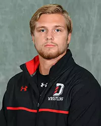 Davidson’s wrestling team pose for head and social media photos at the Belk Arena on Tuesday, October 6, 2020 in Davidson, North Carolina.