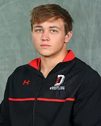 Davidson’s wrestling team pose for head and social media photos at the Belk Arena on Tuesday, October 6, 2020 in Davidson, North Carolina.