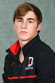Davidson’s wrestling team pose for head and social media photos at the Belk Arena on Tuesday, October 6, 2020 in Davidson, North Carolina.