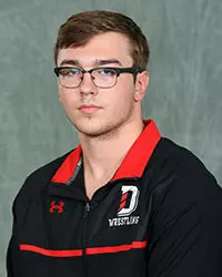 Davidson’s wrestling team pose for head and social media photos at the Belk Arena on Tuesday, October 6, 2020 in Davidson, North Carolina.