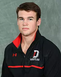 Davidson’s wrestling team pose for head and social media photos at the Belk Arena on Tuesday, October 6, 2020 in Davidson, North Carolina.