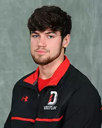 Davidson’s wrestling team pose for head and social media photos at the Belk Arena on Tuesday, October 6, 2020 in Davidson, North Carolina.