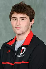 Davidson’s wrestling team pose for head and social media photos at the Belk Arena on Tuesday, October 6, 2020 in Davidson, North Carolina.