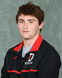 Davidson’s wrestling team pose for head and social media photos at the Belk Arena on Tuesday, October 6, 2020 in Davidson, North Carolina.
