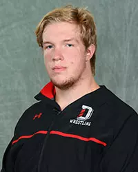 Davidson’s wrestling team pose for head and social media photos at the Belk Arena on Tuesday, October 6, 2020 in Davidson, North Carolina.