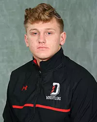Davidson’s wrestling team pose for head and social media photos at the Belk Arena on Tuesday, October 6, 2020 in Davidson, North Carolina.
