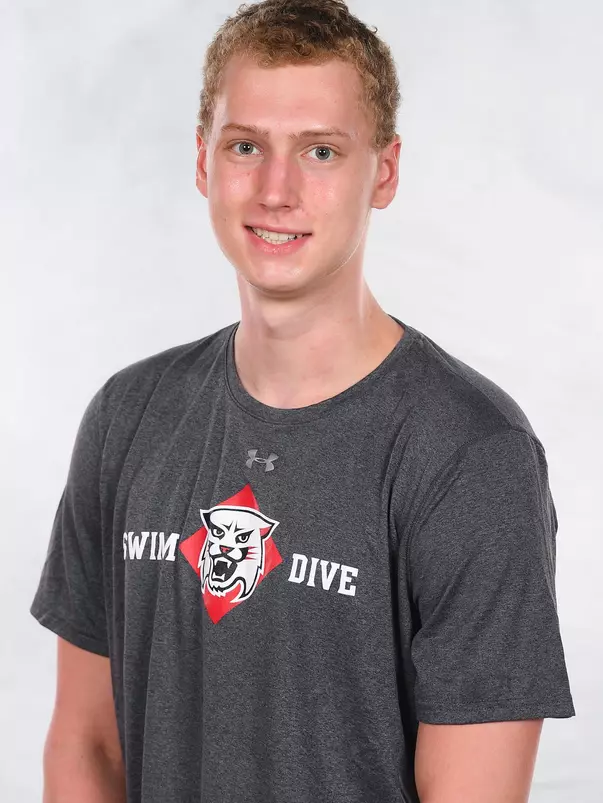 Davidson’s swimming and dive team pose for head and social media photos at the Belk Arena on Thursday, September 17, 2020 in Davidson, North Carolina.