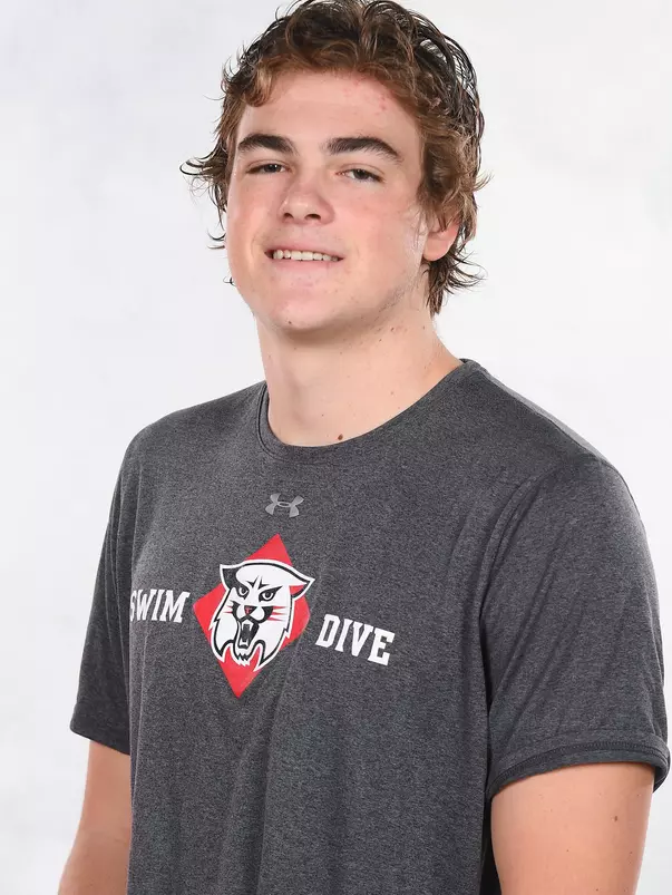 Davidson’s swimming and dive team pose for head and social media photos at the Belk Arena on Thursday, September 17, 2020 in Davidson, North Carolina.