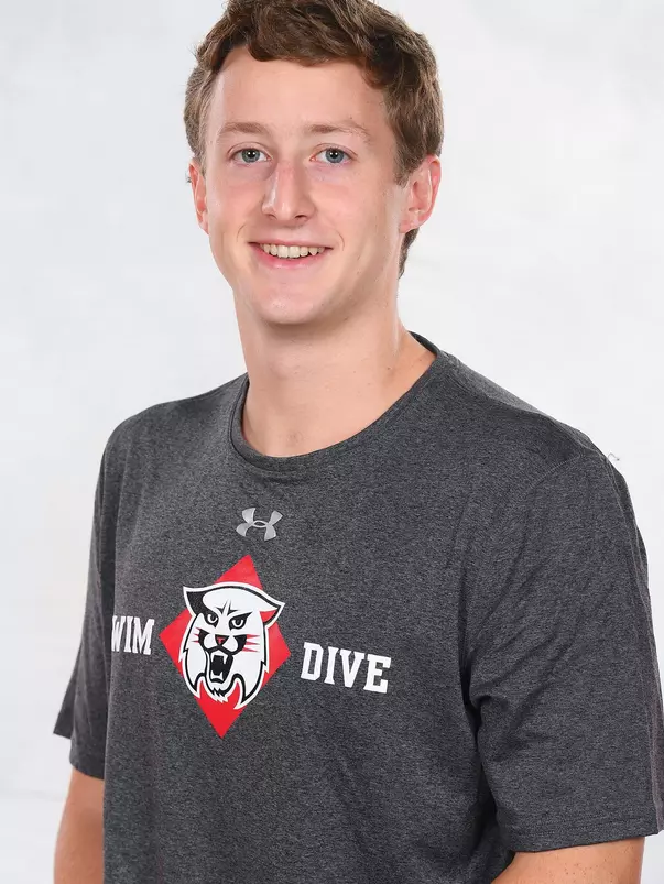 Davidson’s swimming and dive team pose for head and social media photos at the Belk Arena on Thursday, September 17, 2020 in Davidson, North Carolina.