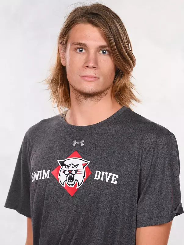 Davidson’s swimming and dive team pose for head and social media photos at the Belk Arena on Thursday, September 17, 2020 in Davidson, North Carolina.