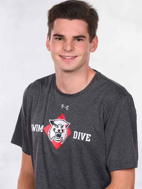 Davidson’s swimming and dive team pose for head and social media photos at the Belk Arena on Thursday, September 17, 2020 in Davidson, North Carolina.