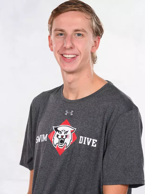 Davidson’s swimming and dive team pose for head and social media photos at the Belk Arena on Thursday, September 17, 2020 in Davidson, North Carolina.