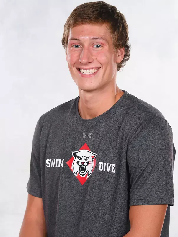 Davidson’s swimming and dive team pose for head and social media photos at the Belk Arena on Thursday, September 17, 2020 in Davidson, North Carolina.
