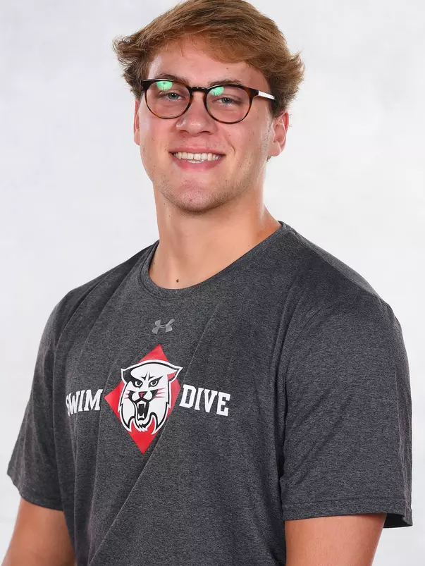 Davidson’s swimming and dive team pose for head and social media photos at the Belk Arena on Thursday, September 17, 2020 in Davidson, North Carolina.
