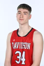 Teams pose for media photos during team media day at Belk Arena on Monday, October 18, 2021 in Davidson, North Carolina.