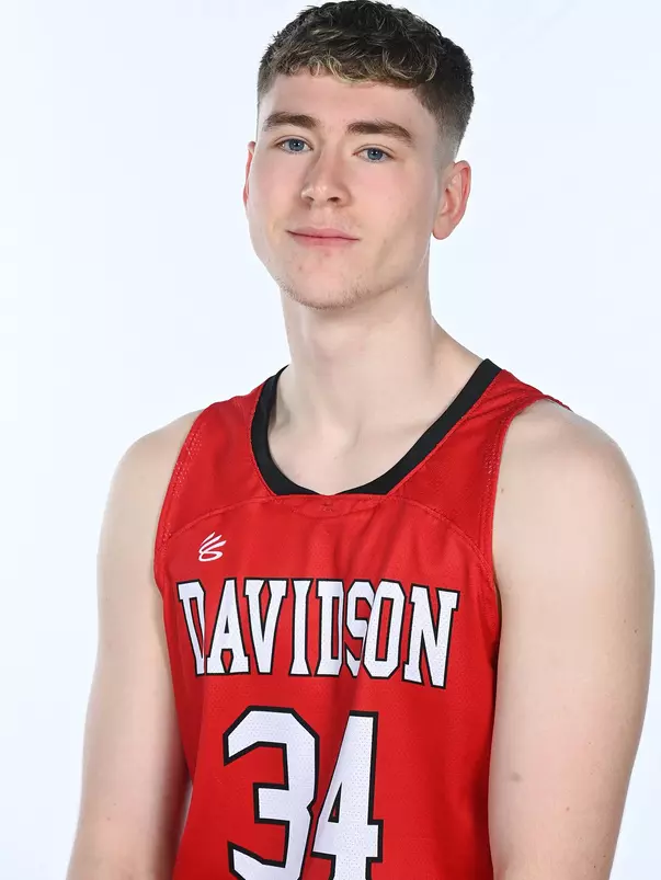 Teams pose for media photos during team media day at Belk Arena on Monday, October 18, 2021 in Davidson, North Carolina.