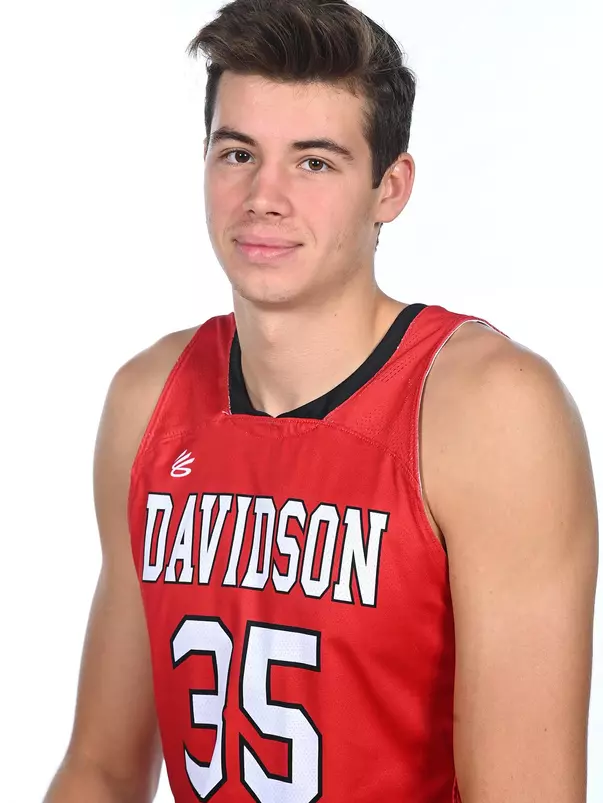 Teams pose for media photos during team media day at Belk Arena on Monday, October 18, 2021 in Davidson, North Carolina.