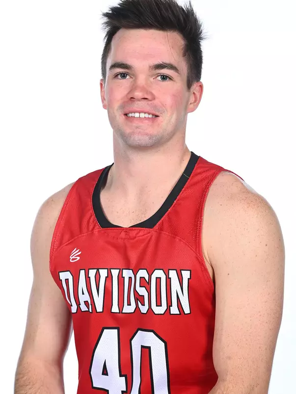 Teams pose for media photos during team media day at Belk Arena on Monday, October 18, 2021 in Davidson, North Carolina.