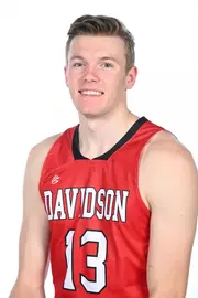 Teams pose for media photos during team media day at Belk Arena on Monday, October 18, 2021 in Davidson, North Carolina.