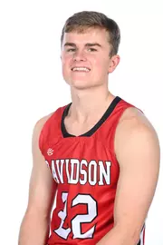 Teams pose for media photos during team media day at Belk Arena on Monday, October 18, 2021 in Davidson, North Carolina.