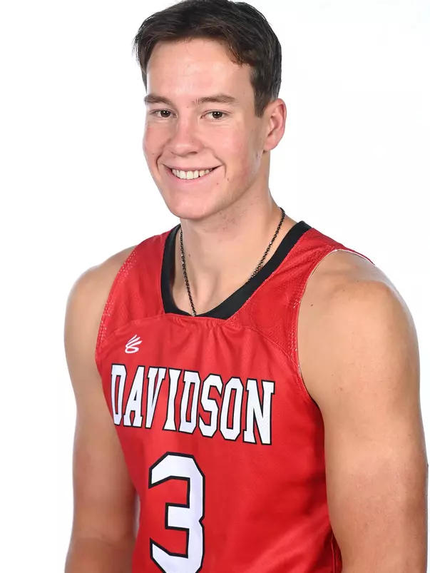 Teams pose for media photos during team media day at Belk Arena on Monday, October 18, 2021 in Davidson, North Carolina.