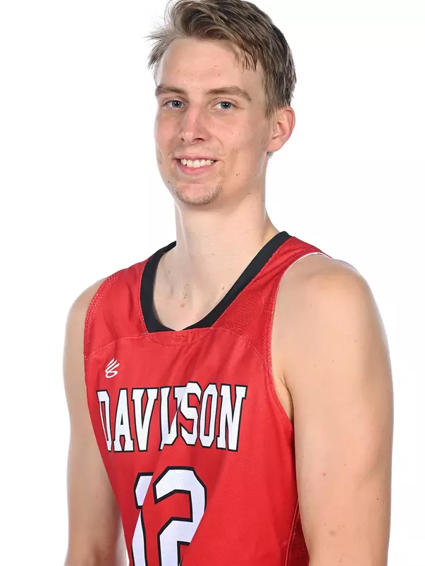 Teams pose for media photos during team media day at Belk Arena on Monday, October 18, 2021 in Davidson, North Carolina.