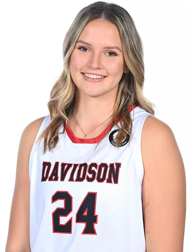 Teams pose for media photos during team media day at Belk Arena on Monday, October 18, 2021 in Davidson, North Carolina.