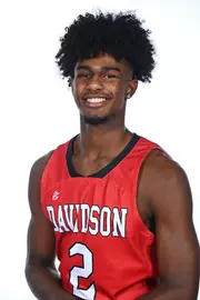 Teams pose for media photos during team media day at Belk Arena on Monday, October 18, 2021 in Davidson, North Carolina.