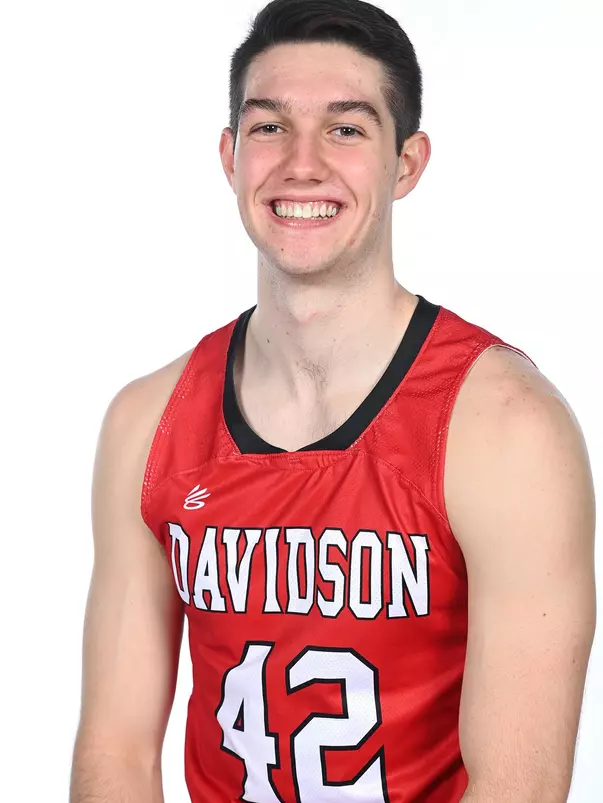 Teams pose for media photos during team media day at Belk Arena on Monday, October 18, 2021 in Davidson, North Carolina.