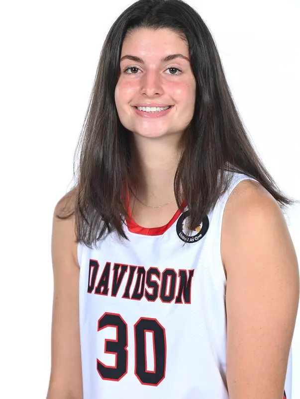 Teams pose for media photos during team media day at Belk Arena on Monday, October 18, 2021 in Davidson, North Carolina.