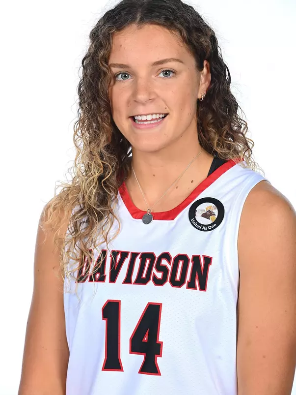 Teams pose for media photos during team media day at Belk Arena on Monday, October 18, 2021 in Davidson, North Carolina.