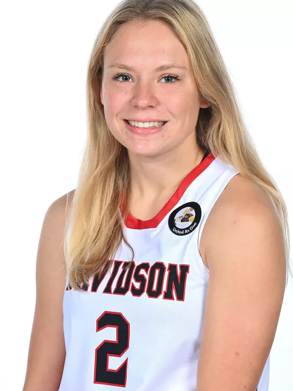 Teams pose for media photos during team media day at Belk Arena on Monday, October 18, 2021 in Davidson, North Carolina.