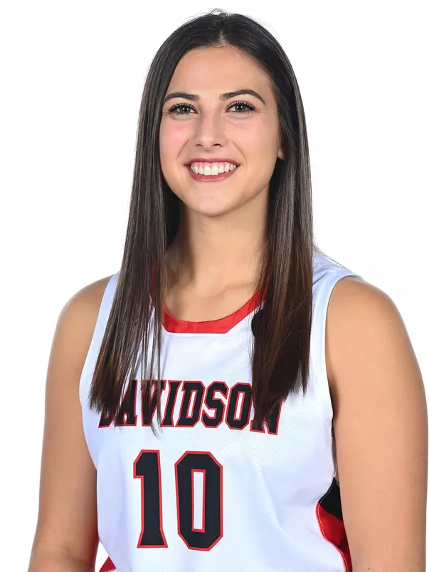 Teams pose for media photos during team media day at Belk Arena on Monday, October 18, 2021 in Davidson, North Carolina.