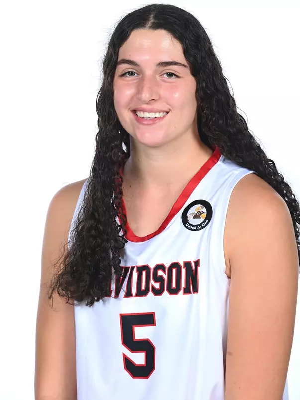 Teams pose for media photos during team media day at Belk Arena on Monday, October 18, 2021 in Davidson, North Carolina.