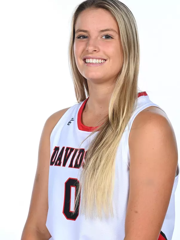 Teams pose for media photos during team media day at Belk Arena on Monday, October 18, 2021 in Davidson, North Carolina.