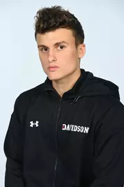 Teams pose for media photos at Belk Arena on Thursday, October 20, 2022 in Davidson, North Carolina.
