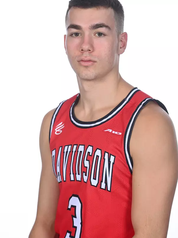 Teams pose for media day photos at  Belk Arena on Friday, October 13, 2023 in Davidson, North Carolina.  Tim Cowie/DavidsonPhotos.com