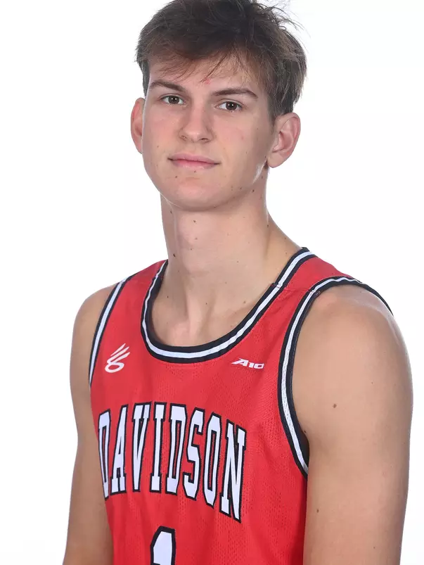 Teams pose for media day photos at  Belk Arena on Friday, October 13, 2023 in Davidson, North Carolina.  Tim Cowie/DavidsonPhotos.com