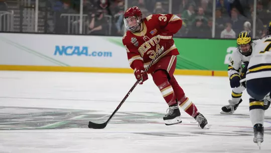 BOSTON, MA - APRIL 07: The Michigan Wolverines take on the Denver Pioneers in the Division I Men?s Ice Hockey Semifinals held at the TD Garden on April 07, 2022 in Boston, Massachusetts. (Photo by Damian Strohmeyer/NCAA Photos via Getty Images)