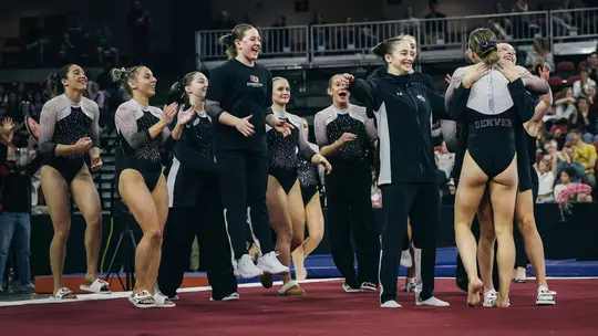 University of Denver Gymnastics Team Celebration on Floor - February 1, 2026