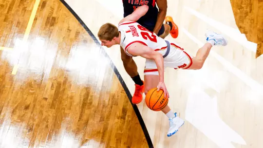 Carson Johnson drives to the hoop.