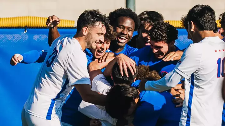 Blue Demons celebrate Liam Mullins goal.
