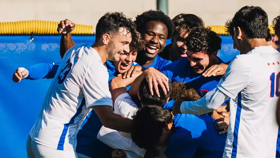 Blue Demons celebrate Liam Mullins goal.
