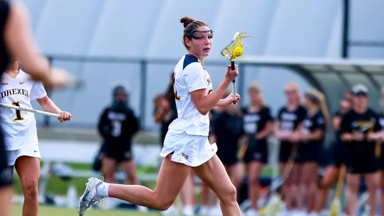 Kate Quinn's Career Day Lifts Dragons Past Towson, 12-9; Drexel Wins Eighth Straight