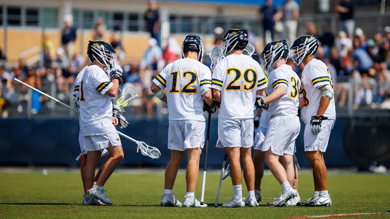 Semple Scores Five as Dragons Pick up Road Victory at Hofstra, 14-6